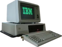 Vintage IBM personal computer and green-text monitor